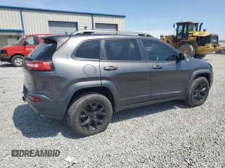 2015 Jeep Cherokee Trailhawk z VIN 1C4PJMBS2FW610618, wystawiony jako Copart lot #52243625 z przebiegiem 136 234 mil mil oraz Szkoda całkowita • Salvage title. Historia ofert i sprzedaży dostępna na DreamBid. Obrazek 3.