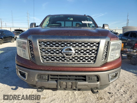 2016 Nissan Titan Platinum Reserve z VIN 1N6BA1F2XGN506885, wystawiony jako Copart lot #80171524 z przebiegiem 318 311 mil mil oraz Czysty tytuł • Clean title. Historia ofert i sprzedaży dostępna na DreamBid. Obrazek 5.