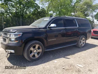 2019 Chevrolet Suburban Premier with VIN 1GNSKJKC3KR327787, listed as a Copart auction lot 56548305 with 87,267 mi miles and Salvage title. Bid and sale history available at DreamBid. Image 1.