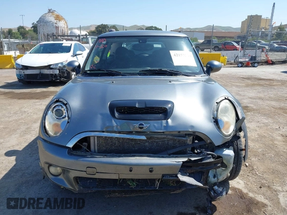 2007 MINI Hardtop S with VIN WMWMF73597TL86892, listed as a IAAI auction lot 42157544 with 93,097 mi miles and . Bid and sale history available at DreamBid. Image 13.