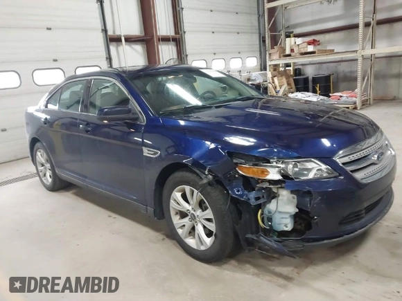2011 Ford Taurus SEL with VIN 1FAHP2EW7BG174493, listed as a IAAI auction lot 41697856 with 143,957 mi miles. Bid and sale history available at carsss.com. Image 1.