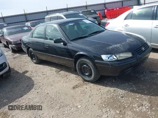 1999 Toyota Camry LE z VIN 4T1BG22K0XU426803, wystawiony jako IAAI lot #41717229 z przebiegiem Nie podano mil oraz . Historia ofert i sprzedaży dostępna na DreamBid. Obrazek 1.