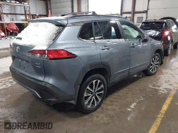 2023 Toyota Corolla Cross XLE with VIN 7MUDAABG9PV078255, listed as a IAAI auction lot 41247877 with 7,325 mi miles and . Bid and sale history available at DreamBid. Image 4.