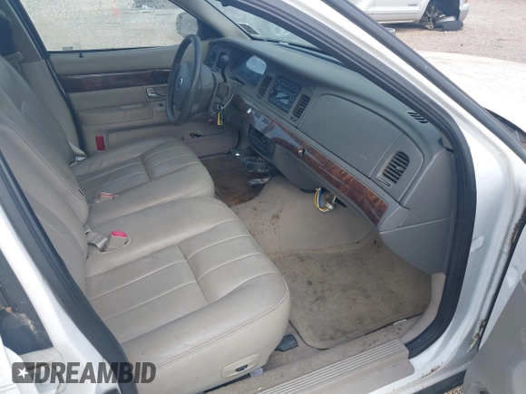 2006 Mercury Grand Marquis LS Premium z VIN 2MEFM75V96X649641, wystawiony jako IAAI lot #42315126 z przebiegiem 144 173 mil mil oraz . Historia ofert i sprzedaży dostępna na DreamBid. Obrazek 5.
