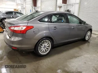 2012 Ford Focus SEL with VIN 1FAHP3H29CL386660, listed as a Copart auction lot 51447905 with 210,075 mi miles and Salvage Title. Bid and sale history available at carsss.com. Image 3.