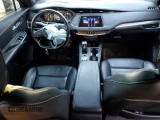 2019 Cadillac XT4 FWD Premium Luxury z VIN 1GYFZCR47KF123621, wystawiony jako Copart lot #69766894 z przebiegiem 68 191 mil mil oraz Szkody całkowita. Historia ofert i sprzedaży dostępna na DreamBid. Obrazek 8.