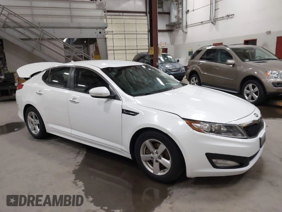 2015 Kia Optima LX with VIN KNAGM4A74F5587995, listed as a IAAI auction lot 41974745 with 206,627 mi miles. Bid and sale history available at carsss.com. Image 1.