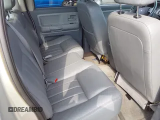 2006 Dodge Dakota SLT z VIN 1D7HW48N76S645515, wystawiony jako IAAI lot #42091904 z przebiegiem 160 695 mil mil oraz . Historia ofert i sprzedaży dostępna na DreamBid. Obrazek 8.