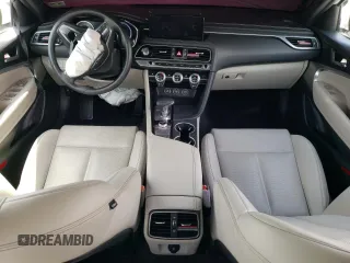 2023 Genesis G70 2.0T z VIN KMTG34TA6PU131925, wystawiony jako Copart lot #52611895 z przebiegiem 30 474 mil mil oraz Szkody całkowita. Historia ofert i sprzedaży dostępna na DreamBid. Obrazek 8.
