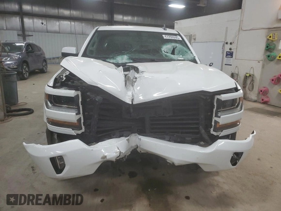 2018 Chevrolet Silverado 1500 LT with VIN 3GCUKRECXJG118122, listed as a Copart auction lot 47293595 with 97,047 mi miles and Salvage Title. Bid and sale history available at DreamBid. Image 5.