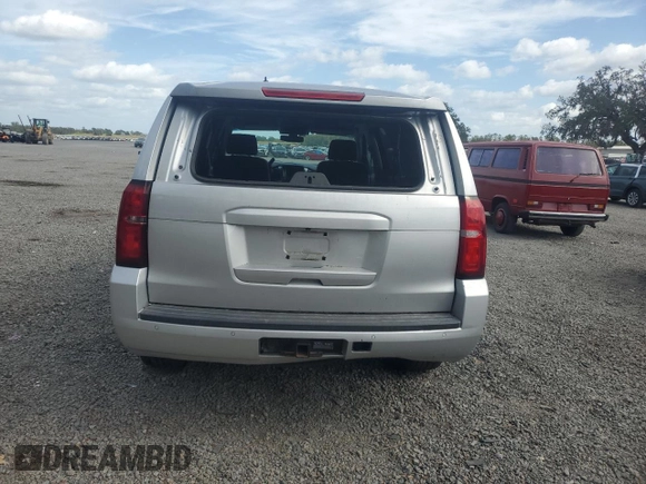 2015 Chevrolet Tahoe z VIN 1GNSK3EC3FR305401, wystawiony jako Copart lot #80819994 z przebiegiem Nie podano mil oraz Szkoda całkowita • Salvage title. Historia ofert i sprzedaży dostępna na DreamBid. Obrazek 6.