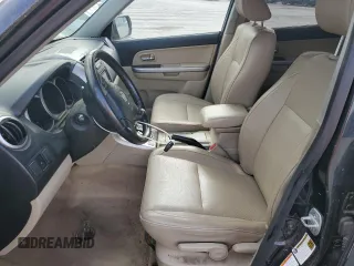 2013 Suzuki Grand Vitara Limited z VIN JS3TD0D79D4100171, wystawiony jako Copart lot #61174905 z przebiegiem 119 394 mil mil oraz Czysty tytuł • Clean title. Historia ofert i sprzedaży dostępna na DreamBid. Obrazek 7.