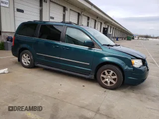 2009 Chrysler Town & Country Touring with VIN 2A8HR541X9R536460, listed as a Copart auction lot 52554635 with 109,744 mi miles and Salvage Title. Bid and sale history available at DreamBid. Image 4.