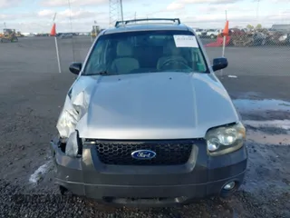 2007 Ford Escape XLT with VIN 1FMYU03Z37KA92572, listed as a IAAI auction lot 41213281 with 129,366 mi miles. Bid and sale history available at carsss.com. Image 12.