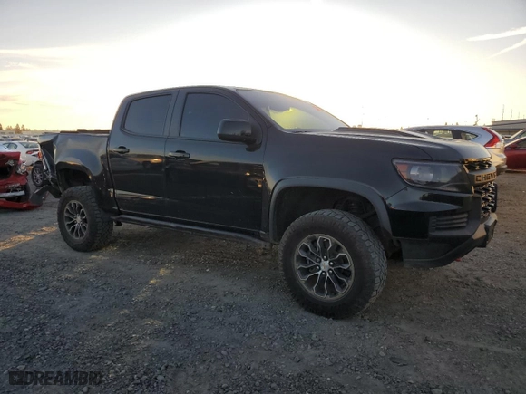 2021 Chevrolet Colorado 4WD ZR2 with VIN 1GCGTEEN6M1169379, listed as a Copart auction lot 87615955 with 34,487 mi miles and Salvage Title. Bid and sale history available at carsss.com. Image 4.