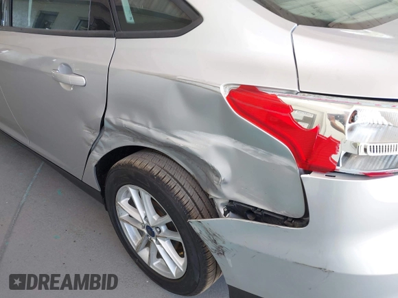 2016 Ford Focus SE with VIN 1FADP3F25GL317830, listed as a IAAI auction lot 42348499 with 8,679 mi miles and . Bid and sale history available at DreamBid. Image 6.