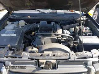 2003 GMC Envoy SLE with VIN 1GKDS13S732134354, listed as a IAAI auction lot 41305506 with 221,733 mi miles. Bid and sale history available at carsss.com. Image 10.