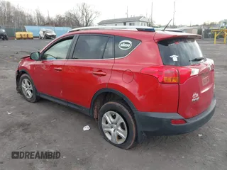 2015 Toyota RAV4 LE with VIN JTMBFREV0FD125632, listed as a IAAI auction lot 41886454 with 164,409 mi miles. Bid and sale history available at carsss.com. Image 3.