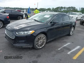 2014 Ford Fusion SE with VIN 3FA6P0HD5ER182028, listed as a IAAI auction lot 42108063 with 198,131 mi miles and . Bid and sale history available at DreamBid. Image 2.