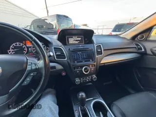 2018 Acura RDX Technology with VIN 5J8TB3H50JL010568, listed as a Copart auction lot 87761635 with 129,034 mi miles and Clean Title. Bid and sale history available at DreamBid. Image 9.