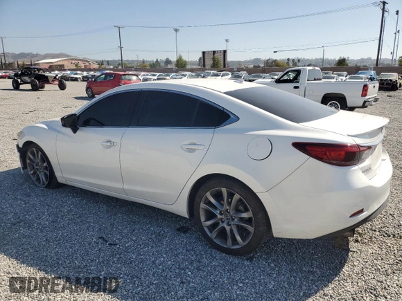 2016 Mazda 6 i Grand Touring с VIN JM1GJ1W53G1404533, выставлен на аукционе Copart как лот 46860575 с пробегом 94 105 миль миль и Списание • Salvage title. История ставок и продаж доступна на DreamBid. Изображение 2.