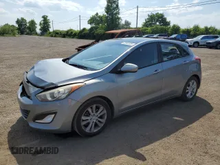 2014 Hyundai Elantra with VIN KMHD35LH9EU223995, listed as a Copart auction lot 61991935 with 102,650 mi miles and Salvage title. Bid and sale history available at DreamBid. Image 1.