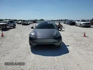 2022 Tesla Model Y Performance z VIN 7SAYGDEF5NF574382, wystawiony jako Copart lot #48531565 z przebiegiem 35 165 mil mil oraz Szkoda całkowita • Salvage title. Historia ofert i sprzedaży dostępna na DreamBid. Obrazek 13.