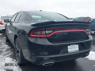 2022 Dodge Charger SXT with VIN 2C3CDXBG0NH157720, listed as a IAAI auction lot 41559731 with 21,062 mi miles and . Bid and sale history available at carsss.com. Image 3.