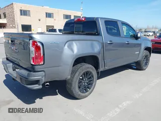 2022 GMC Canyon 4WD Elevation z VIN 1GTG6CENXN1304361, wystawiony jako IAAI lot #41990960 z przebiegiem 23 151 mil mil oraz . Historia ofert i sprzedaży dostępna na DreamBid. Obrazek 4.