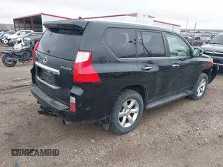 2011 Lexus GX 460 with VIN JTJBM7FXXB5021029, listed as a IAAI auction lot 41944230 with 209,722 mi miles. Bid and sale history available at carsss.com. Image 4.
