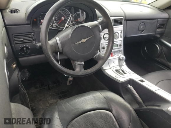 2005 Chrysler Crossfire Limited z VIN 1C3AN65L25X045357, wystawiony jako Copart lot #57453145 z przebiegiem 153 164 mil mil oraz Szkoda całkowita • Salvage title. Historia ofert i sprzedaży dostępna na DreamBid. Obrazek 8.