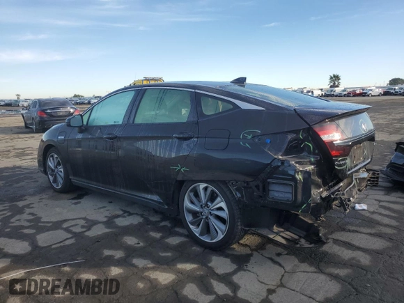 2018 Honda Clarity with VIN JHMZC5F1XJC022159, listed as a Copart auction lot 87274624 with 58,680 mi miles and Salvage Title. Bid and sale history available at DreamBid. Image 2.