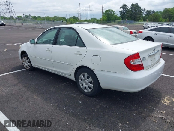 2004 Toyota Camry LE with VIN 4T1BE32K64U277496, listed as a IAAI auction lot 42130199 with 250,972 mi miles. Bid and sale history available at carsss.com. Image 3.