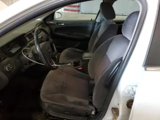 2012 Chevrolet Impala LS Fleet z VIN 2G1WF5E35C1129670, wystawiony jako Copart lot #59518765 z przebiegiem 181 123 mil mil oraz Szkoda całkowita • Salvage title. Historia ofert i sprzedaży dostępna na DreamBid. Obrazek 7.