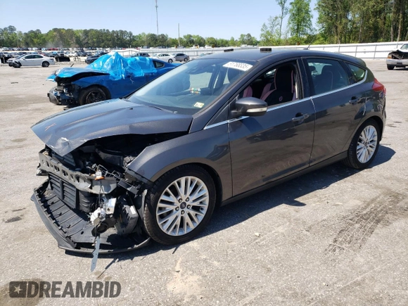 2016 Ford Focus Titanium with VIN 1FADP3N27GL201482, listed as a Copart auction lot 51768335 with 54,463 mi miles and Salvage title. Bid and sale history available at DreamBid. Image 1.