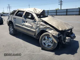 2005 Jeep Grand Cherokee Laredo z VIN 1J4HR48N65C517657, wystawiony jako Copart lot #58774685 z przebiegiem Nie podano mil oraz Szkoda całkowita • Salvage title. Historia ofert i sprzedaży dostępna na DreamBid. Obrazek 4.