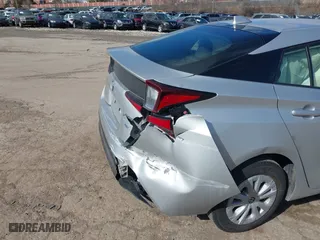 2022 Toyota Prius L Eco with VIN JTDKAMFU7N3176041, listed as a IAAI auction lot 41562977 with 61,964 mi miles. Bid and sale history available at carsss.com. Image 6.