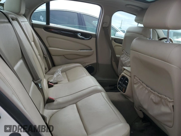 2004 Jaguar XJ with VIN SAJWA71C44SG34094, listed as a Copart auction lot 74969004 with 0 mi miles and Salvage Title. Bid and sale history available at carsss.com. Image 10.