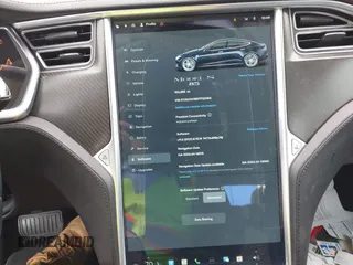 2014 Tesla Model S 60 with VIN 5YJSA1H19EFP32063, listed as a IAAI auction lot 42360872 with 103,495 mi miles and . Bid and sale history available at DreamBid. Image 18.
