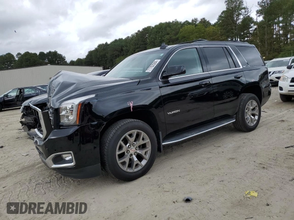 2017 GMC Yukon SLT with VIN 1GKS2BKC2HR406007, listed as a Copart auction lot 71702084 with 66,828 mi miles and Salvage Title. Bid and sale history available at carsss.com. Image 1.