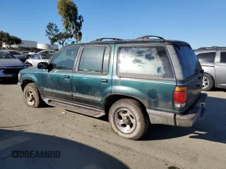 1996 Ford Explorer XL z VIN 1FMDU34X0TUC31973, wystawiony jako Copart lot #87892655 z przebiegiem 142 774 mil mil oraz Tytuł czysty. Historia ofert i sprzedaży dostępna na DreamBid. Obrazek 2.