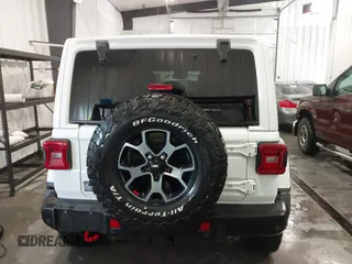 2022 Jeep Wrangler Unlimited Rubicon z VIN 1C4HJXFG7NW106446, wystawiony jako IAAI lot #41405202 z przebiegiem 39 755 mil mil oraz . Historia ofert i sprzedaży dostępna na DreamBid. Obrazek 16.