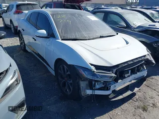 2020 Jaguar I-Pace SE with VIN SADHC2S14L1F85800, listed as a IAAI auction lot 42444115 with 51,249 mi miles and . Bid and sale history available at DreamBid. Image 1.