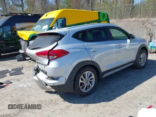 2018 Hyundai Tucson SEL with VIN KM8J3CA42JU771483, listed as a IAAI auction lot 42159936 with 91,604 mi miles and . Bid and sale history available at DreamBid. Image 4.