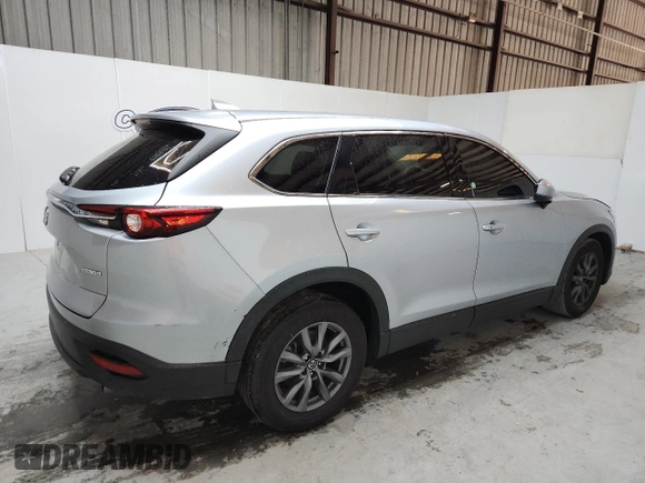 2023 Mazda CX-9 Touring with VIN JM3TCBCY9P0656636, listed as a Copart auction lot 64243905 with 59,788 mi miles and Non repairable. Bid and sale history available at DreamBid. Image 3.