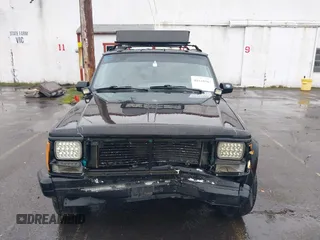 1996 Jeep Cherokee SE with VIN 1J4FJ28S9TL135564, listed as a IAAI auction lot 41618367 with 249,410 mi miles and . Bid and sale history available at DreamBid. Image 12.