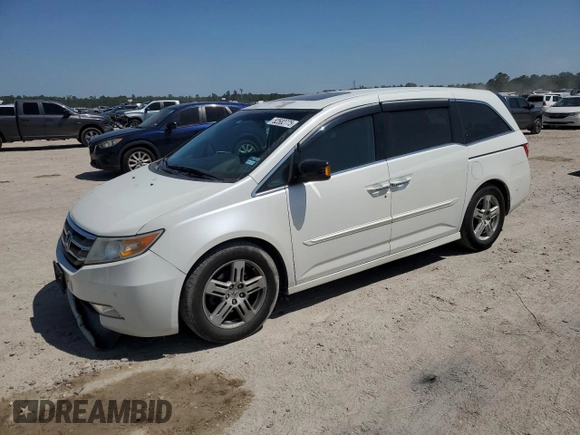 2013 Honda Odyssey Touring with VIN 5FNRL5H94DB021388, listed as a Copart auction lot 52582775 with 141,566 mi miles and Salvage Title. Bid and sale history available at carsss.com. Image 1.