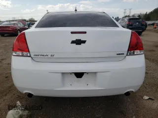 2014 Chevrolet Impala LT with VIN 2G1WB5E31E1154130, listed as a Copart auction lot 54212785 with 150,169 mi miles and Salvage title. Bid and sale history available at DreamBid. Image 6.