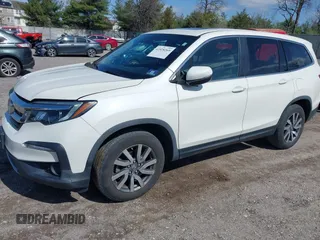 2019 Honda Pilot EX-L with VIN 5FNYF6H51KB052648, listed as a IAAI auction lot 41928269 with 67,878 mi miles and . Bid and sale history available at carsss.com. Image 2.