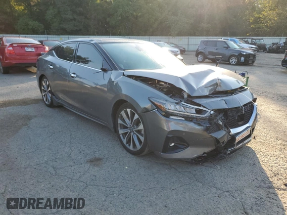 2023 Nissan Maxima Platinum with VIN 1N4AA6FV4PC505934, listed as a Copart auction lot 74889614 with 10,454 mi miles and Salvage title. Bid and sale history available at DreamBid. Image 4.